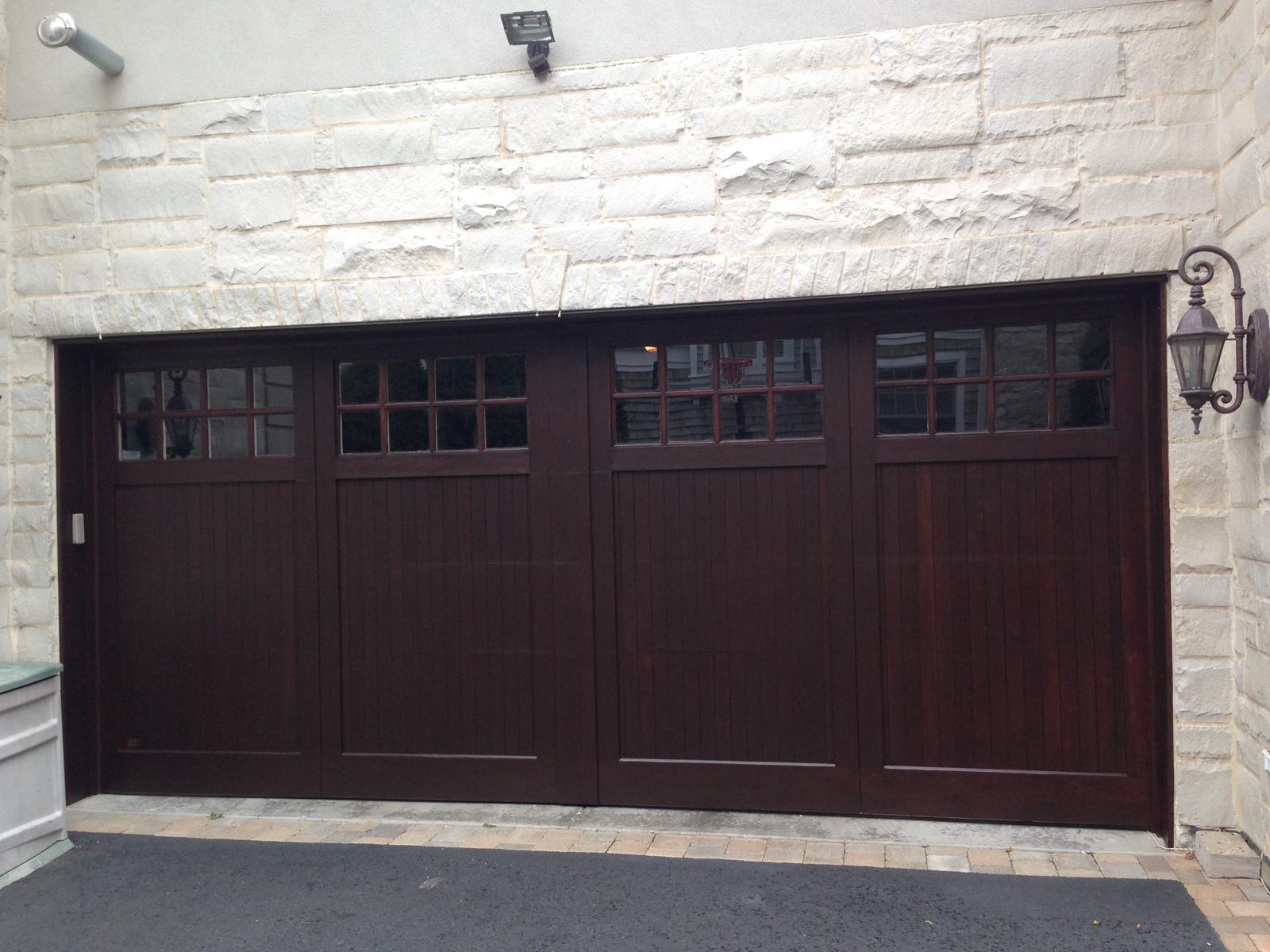 Dark stained wood garage door
