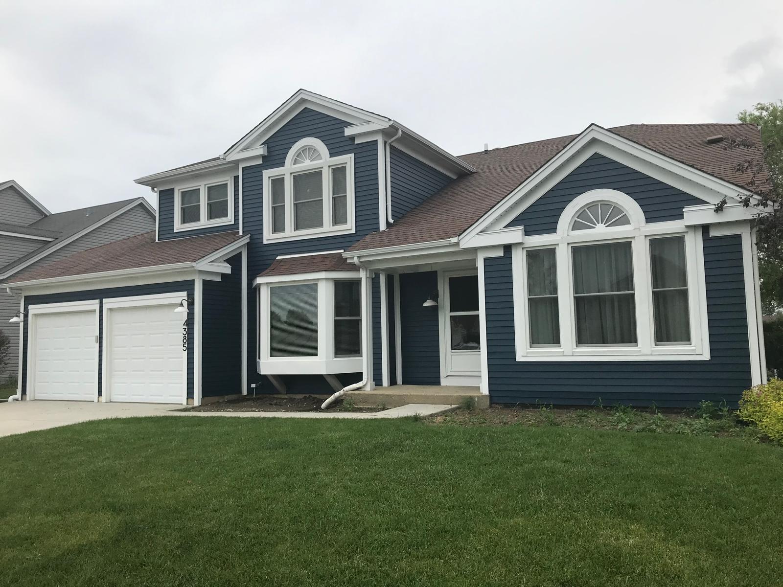 Navy blue exterior house painting